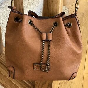Darcy Marks London brown crossbody purse, bucket bag.